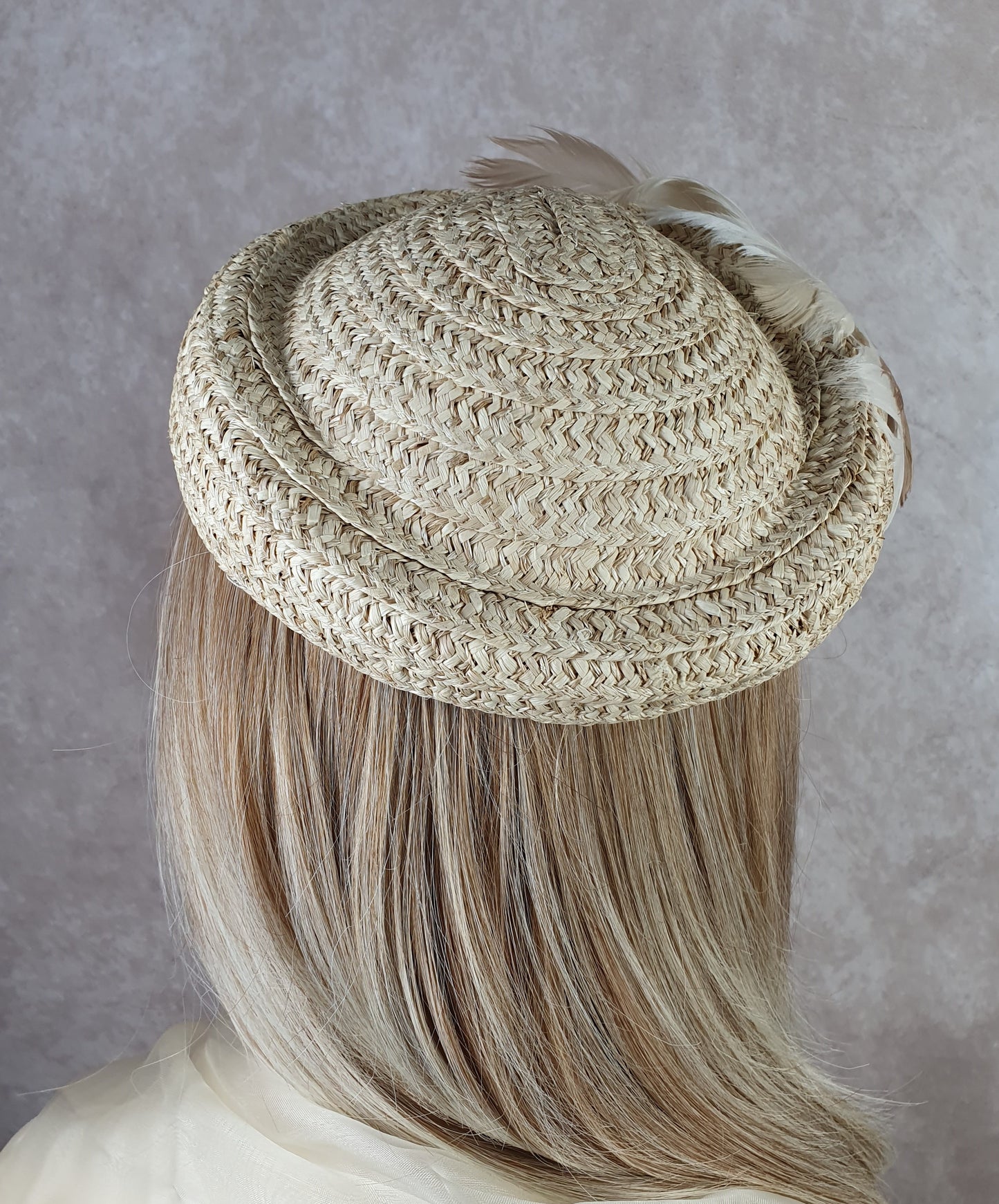 Handmade beige straw pillbox hat with swan feathers, elegant ladies headdress, summer hat for weddings and special events.