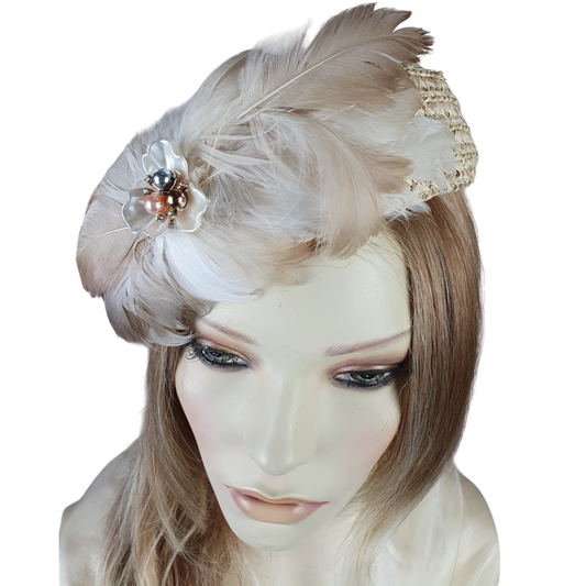 Handmade beige straw pillbox hat with swan feathers, elegant ladies headdress, summer hat for weddings and special events.