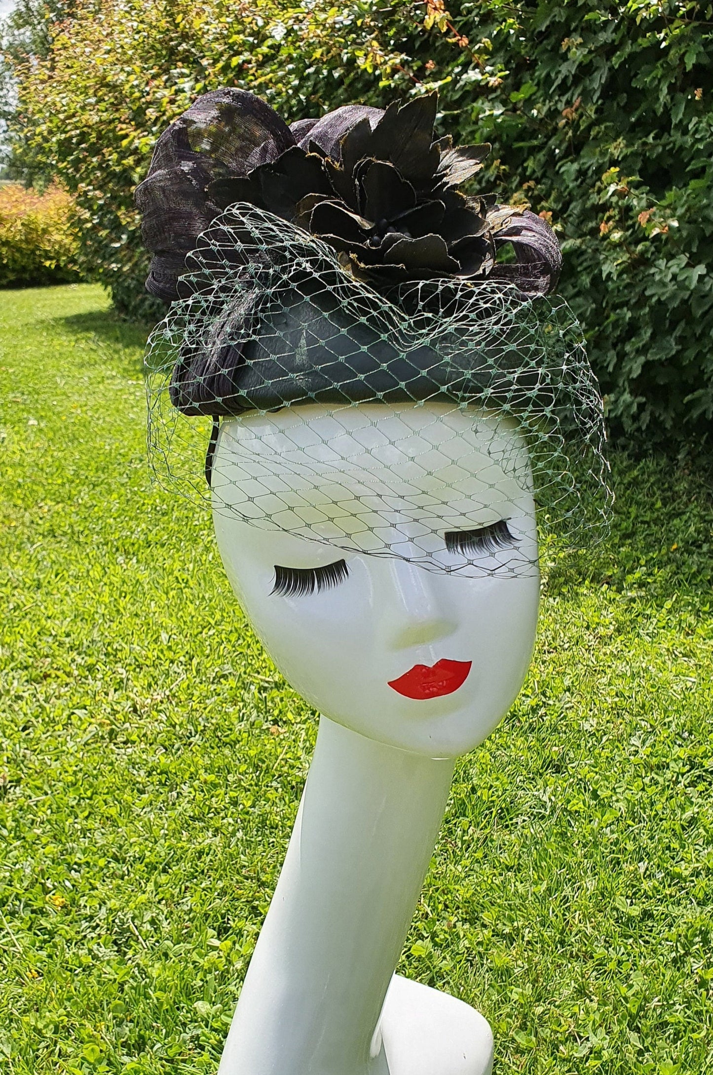Handmade fascinator green with black made of natural leather, women's headpiece, guest dress - for a wedding or special occasion.