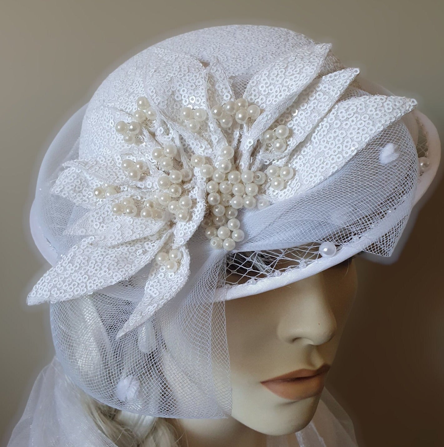 Handmade fascinator made of sequin crinoline material with veil - perfect for weddings and festive occasions