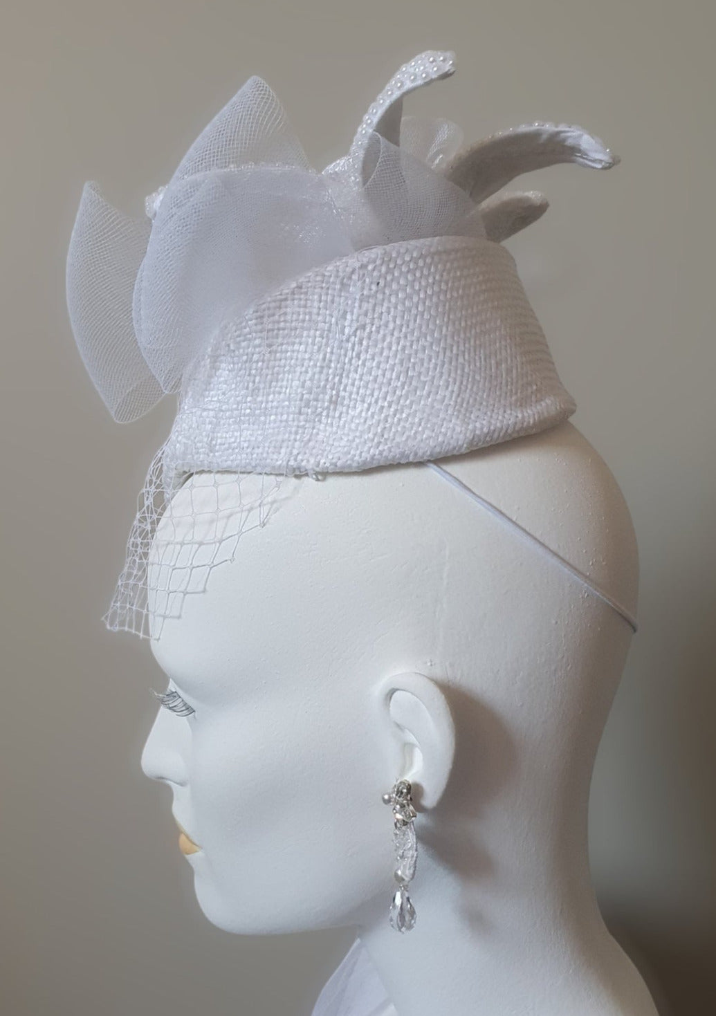 Handmade Fascinator from White Visca Material - Perfect for Weddings and Festive Occasions